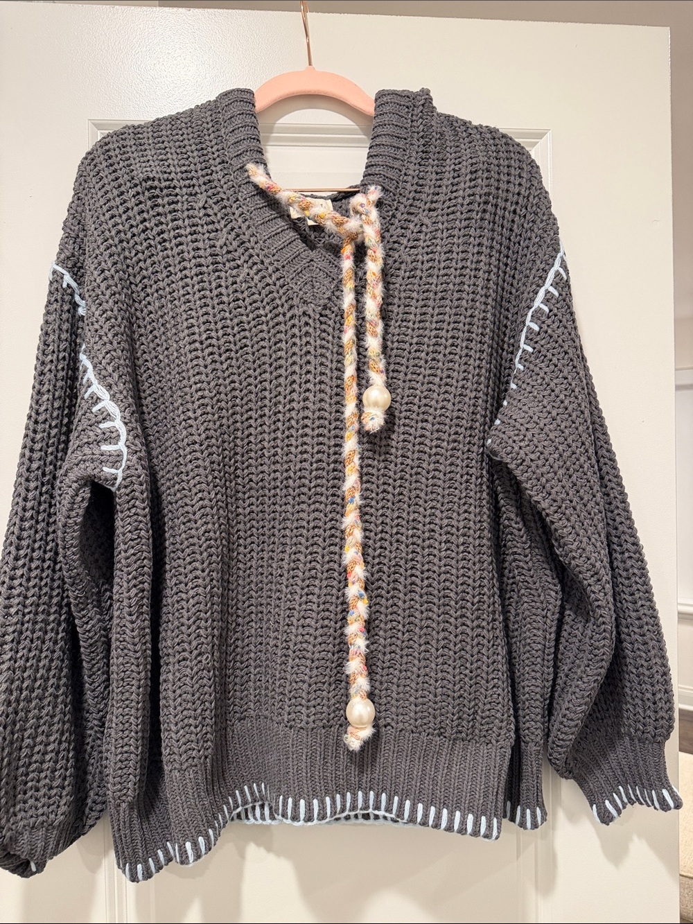 Cozy Charcoal Knit Pullover Sweater with Tassel Drawstring and hood
